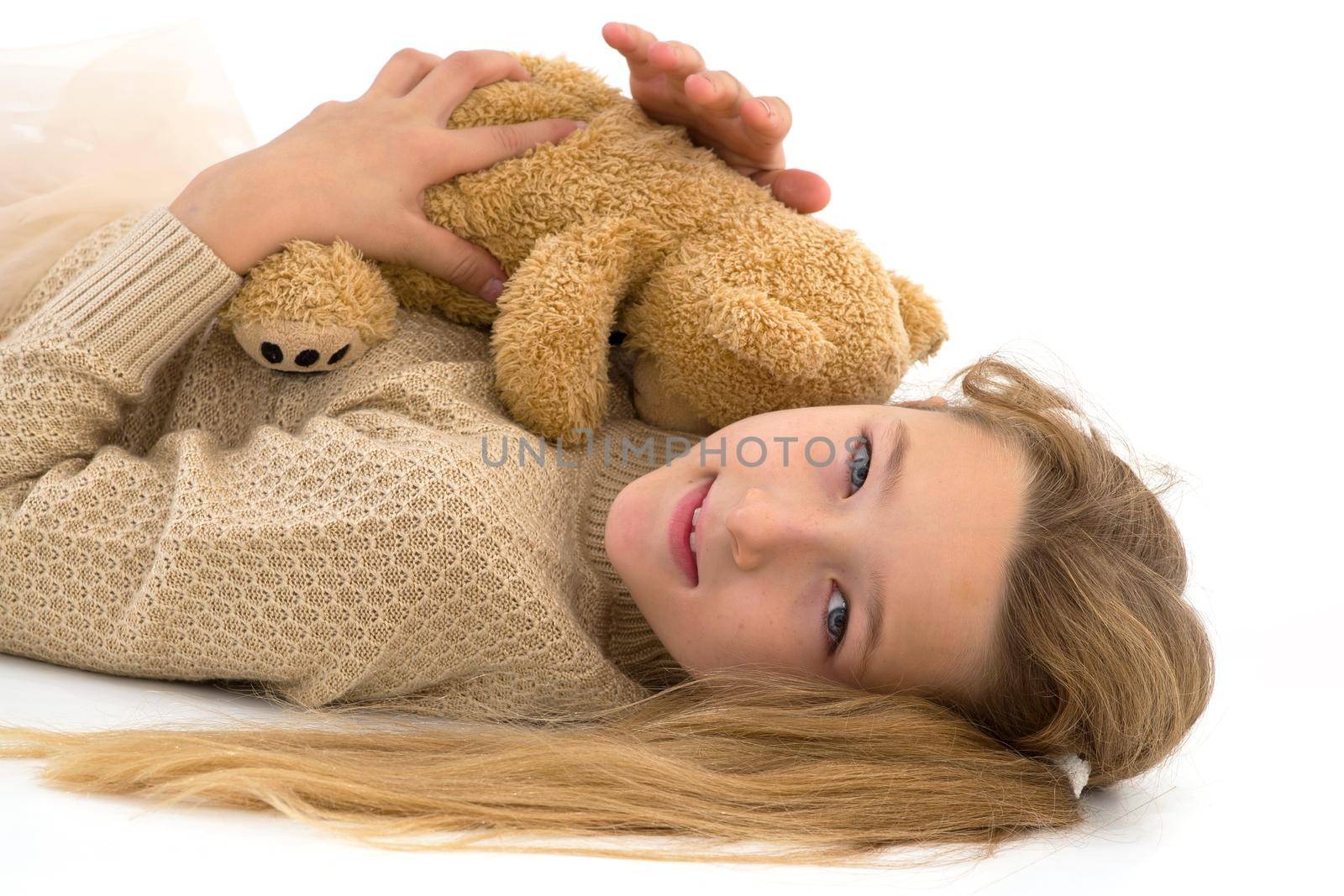 Little girl with teddy bear.The concept of a happy childhood, children emotions. by kolesnikov_studio