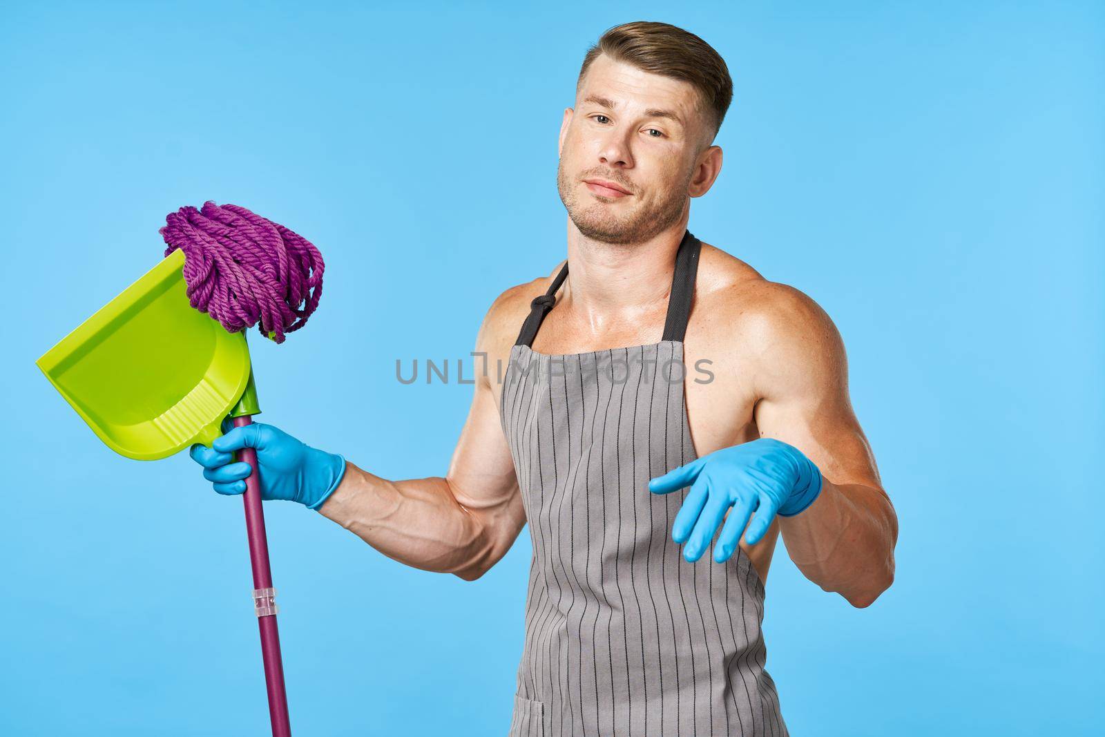 pumped up man cleaner mop scoop service. High quality photo