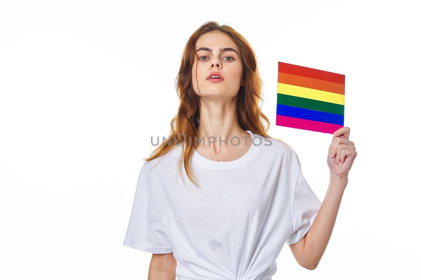 woman wearing white t-shirt lgbt Flag transgender community Protest. High quality photo