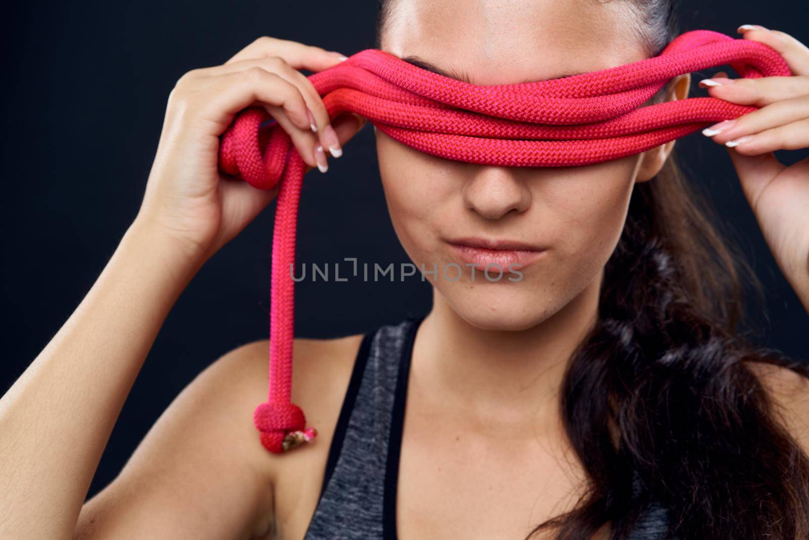 woman athlete fitness workout exercise close-up black background by Vichizh