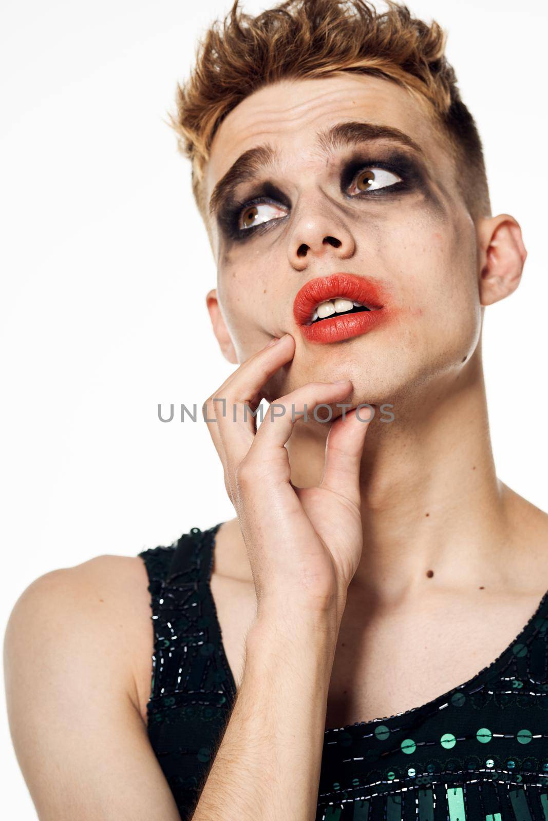 male transgender female makeup fashion posing studio. High quality photo