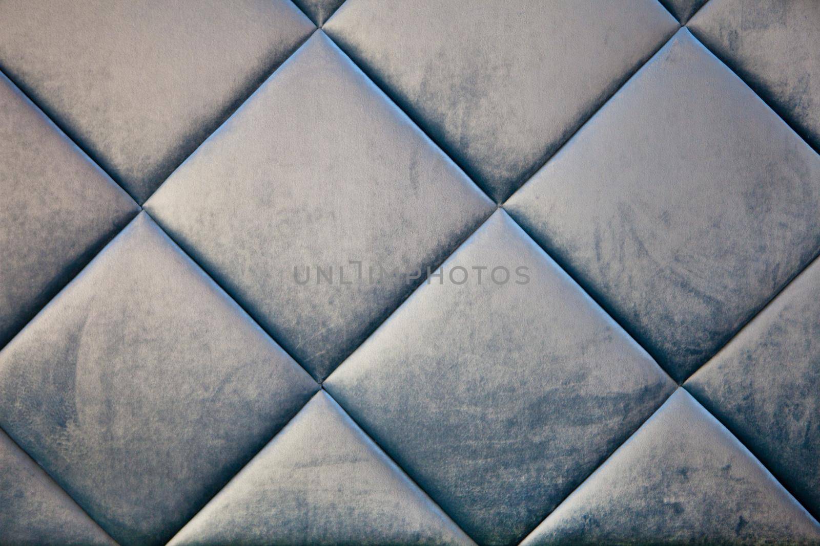 Blue velvet like texture detail background. blue teal velvet textile capotone or checkered soft tufted backdrop. textile squares