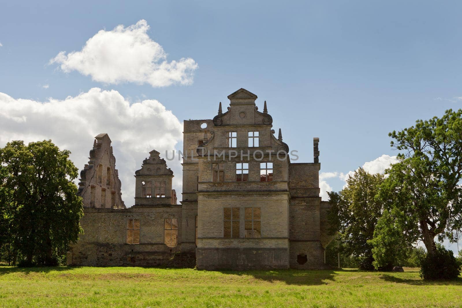 UNGRU, ESTONIA - July 30, 2020: Abandoned Ungru castle in Estonia. Limestone building architecture. Neo-baroque building ruins of the Ungru manor, Estonia