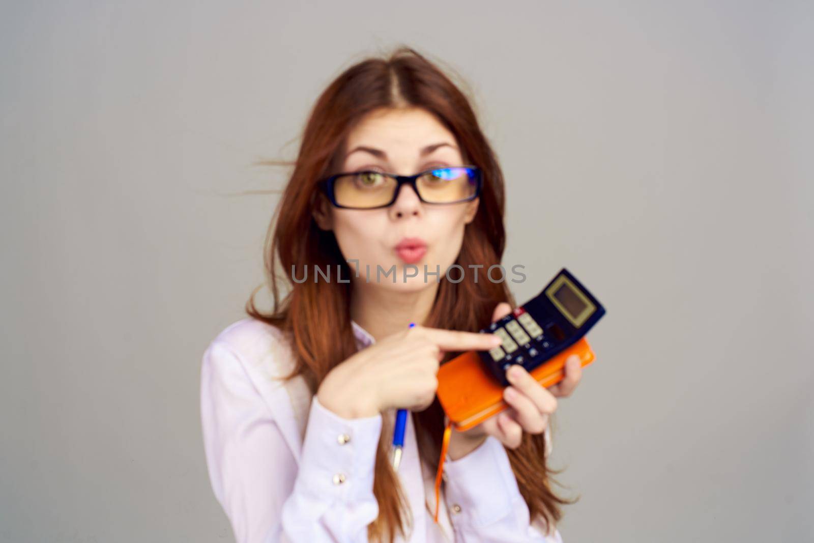 Business woman secretary working calculator office professional. High quality photo
