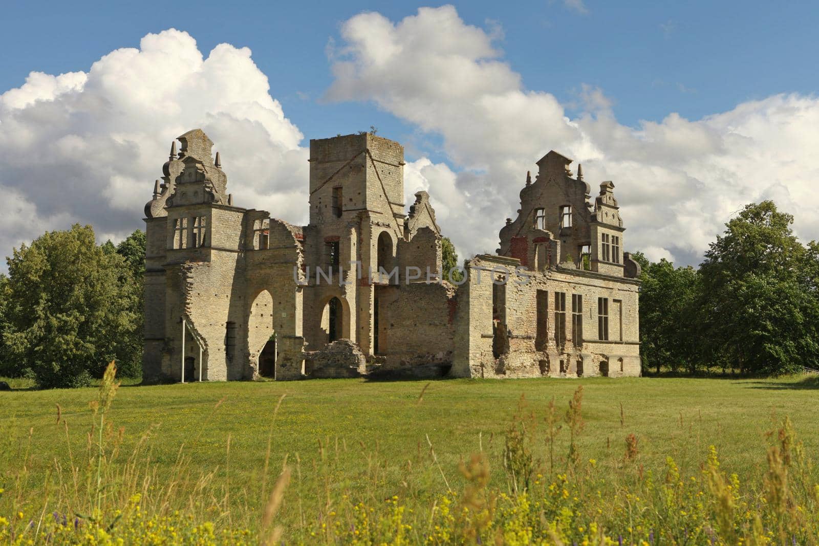 UNGRU, ESTONIA - July 30, 2020: Abandoned Ungru castle in Estonia. Limestone building architecture. Neo-baroque building ruins of the Ungru manor, Estonia