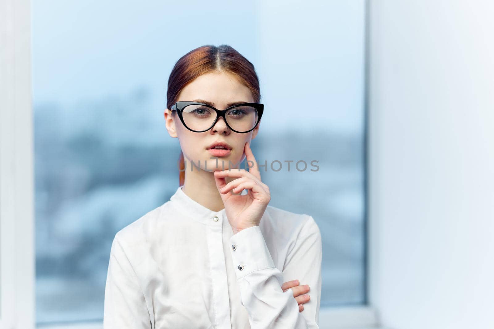 woman secretary in white shirt office work professional. High quality photo
