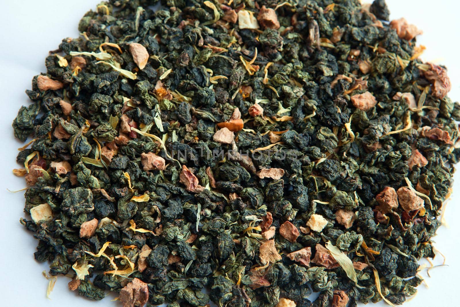 dried green tea leafs with peaches - Green fruit tea with dry peach and strawberry
