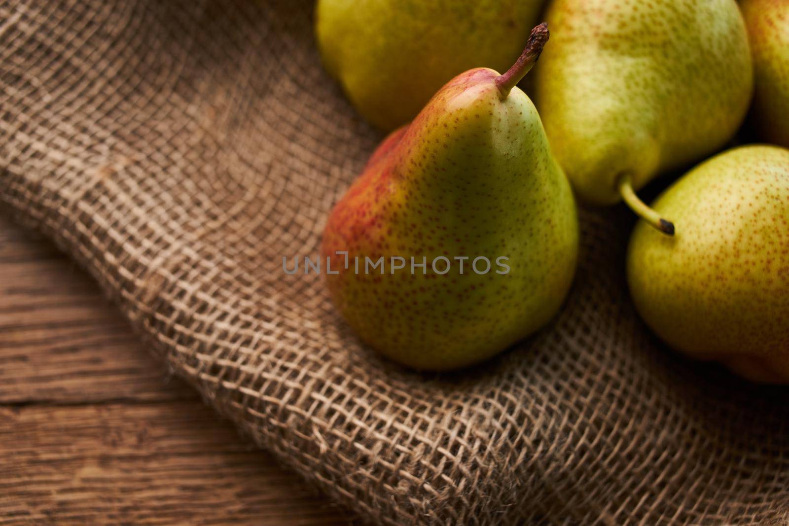 pears on wooden table agriculture vitamins close-up. High quality photo