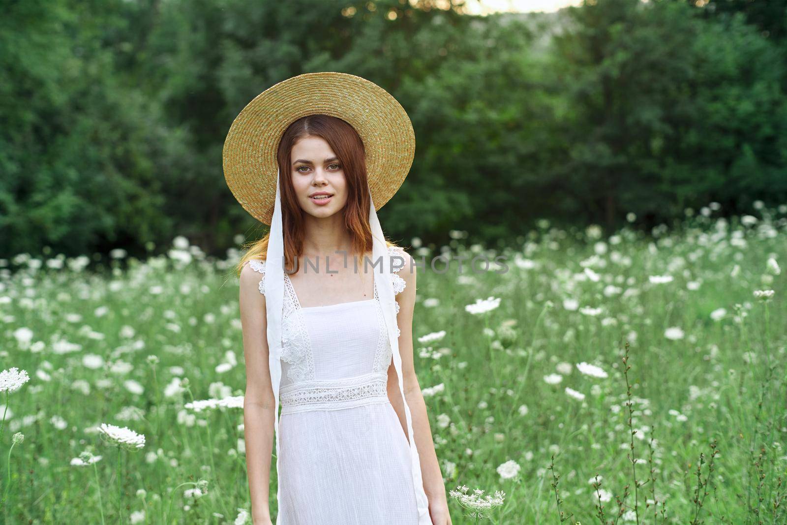 Woman in white dress flowers nature walk charm. High quality photo