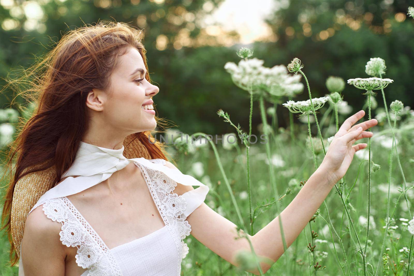 cheerful women in white dress and posing nature luxury. High quality photo