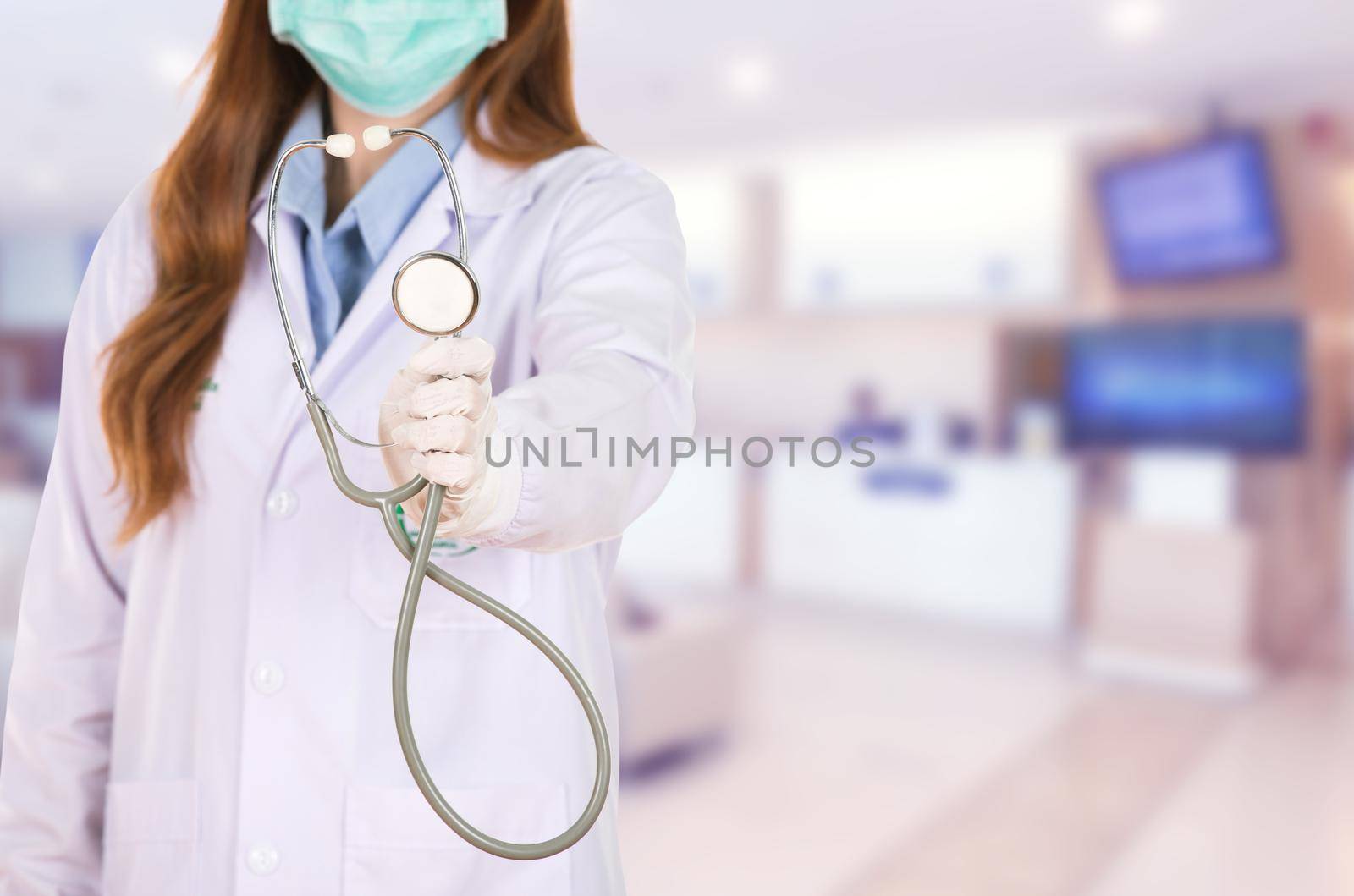 Female doctor with mask and stethoscope isolated on white background