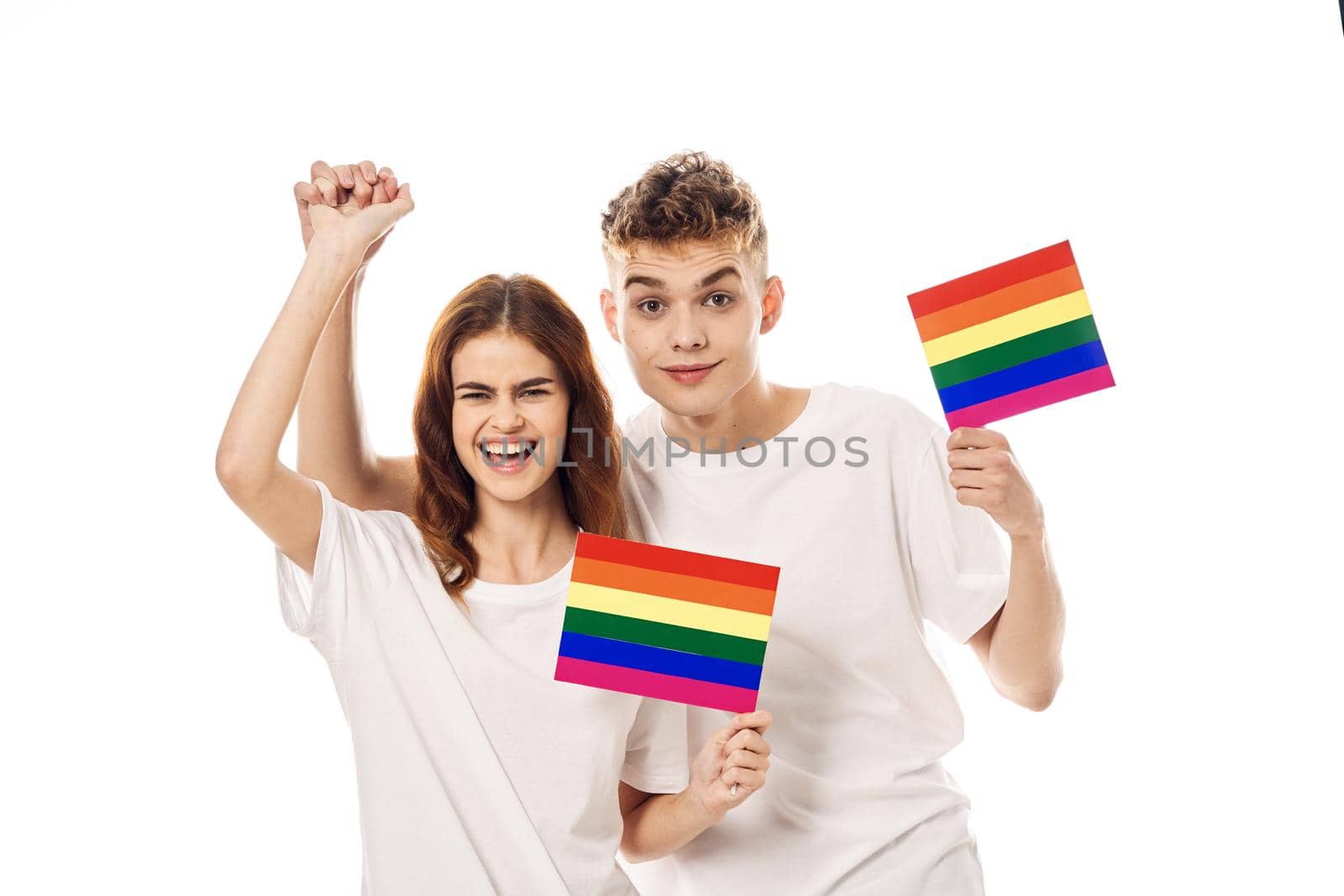 young couple lgbt Flag transgender lifestyle light background. High quality photo