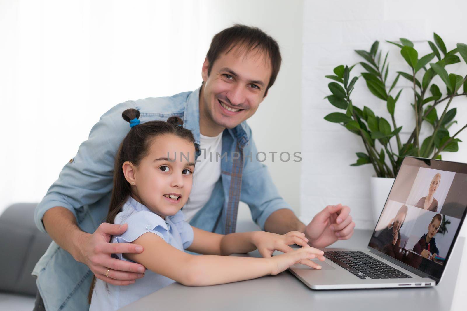Digital composite of People using a computer with E-Learning information in the screen by Andelov13