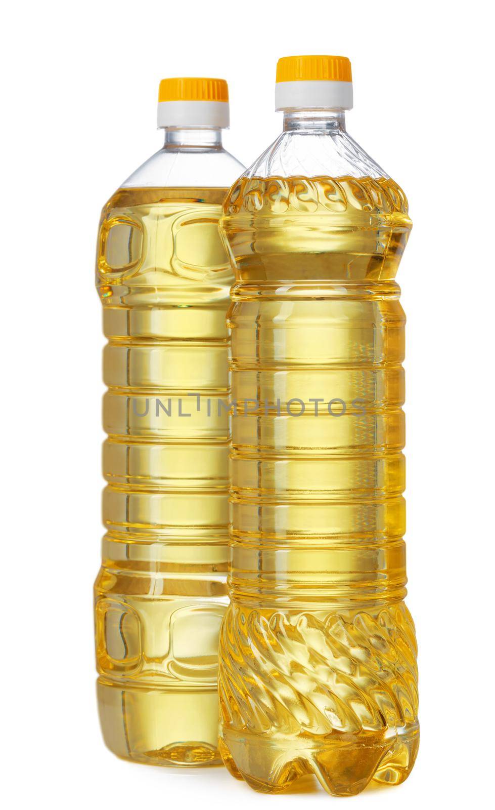 Set of sunflower oil in plastic bottle isolated on white background, close up.