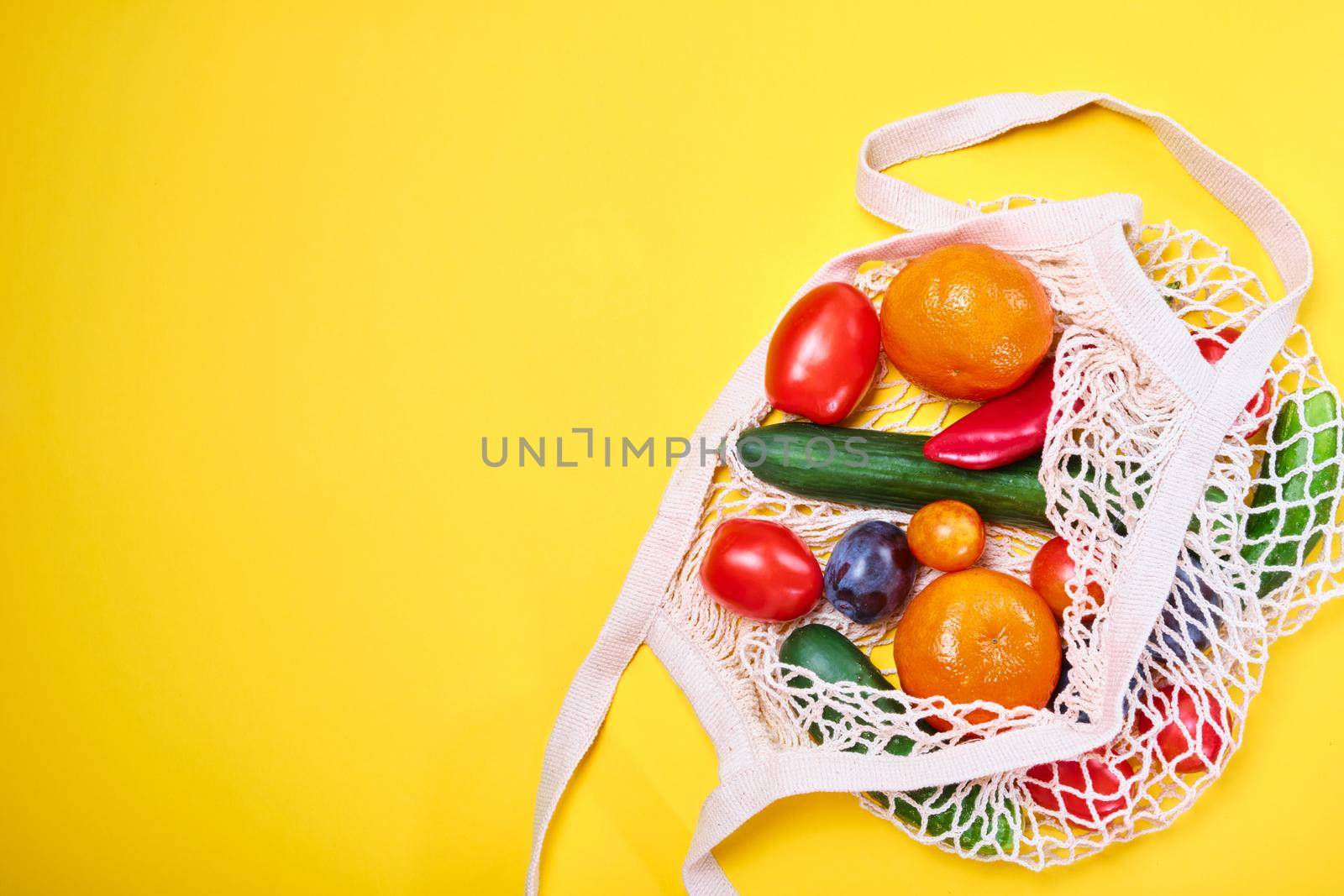 groceries in eco bags. eco natural bags with fruits and vegetables, eco friendly, flat lay. sustainable lifestyle concept. zero waste food shopping. plastic free items. reuse, reduce, recycle, refuse