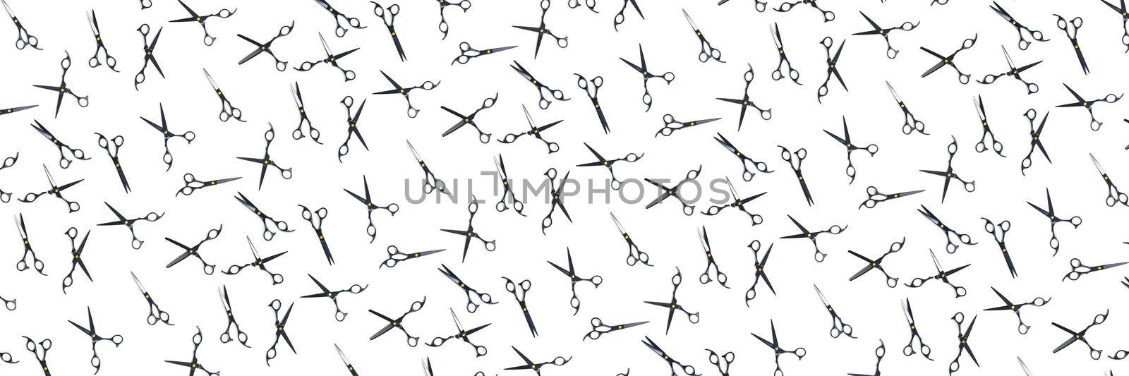 Background of black scissors. professional hairdresser black scissors isolated on white. Black barber scissors, close up. pop art background, for prints or posters. not seamless pattern