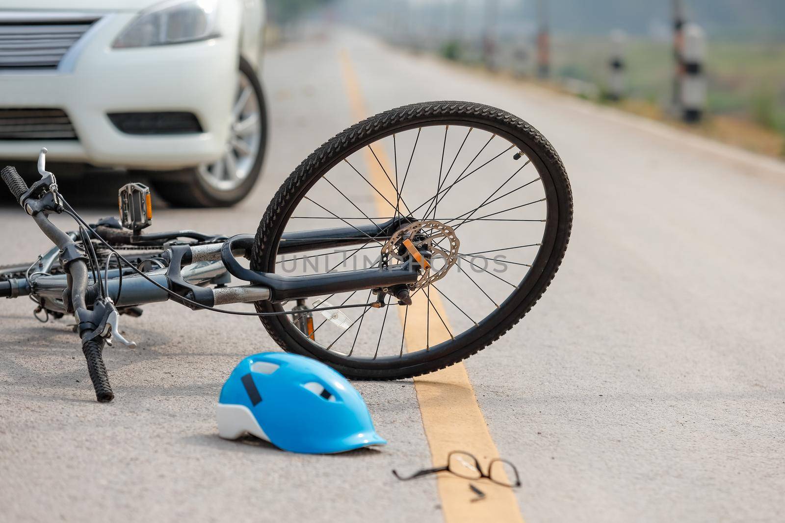 Accident car crash with bicycle on road