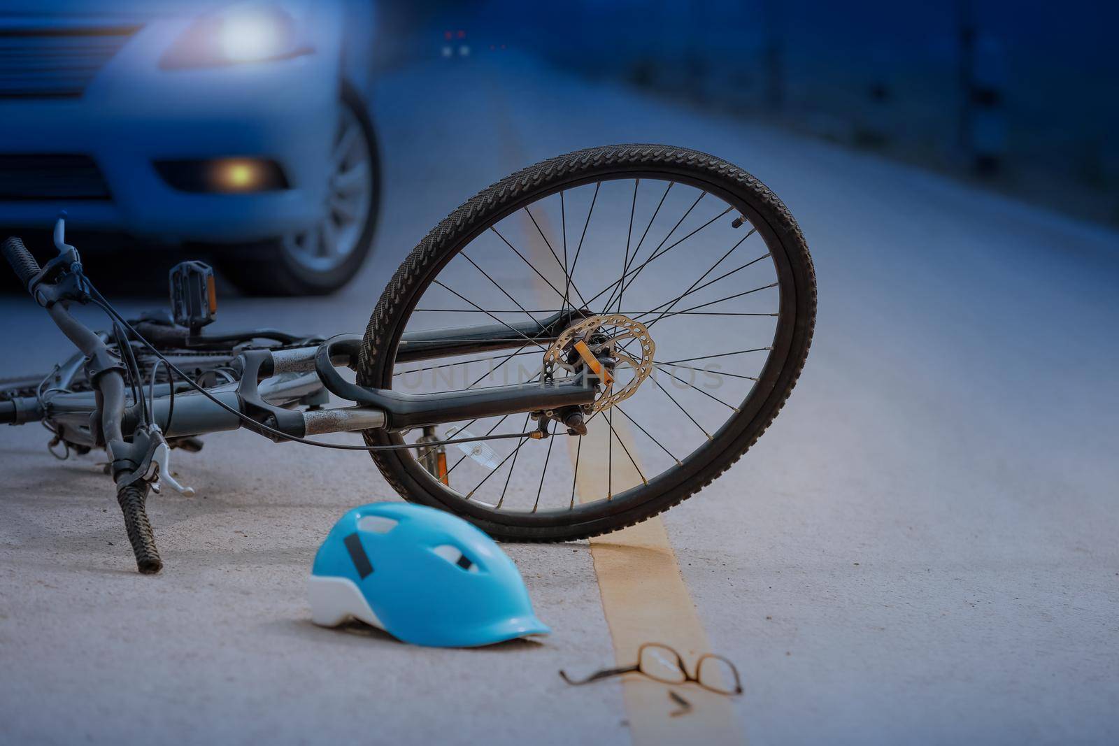 Accident car crash with bicycle on road ,nighttime