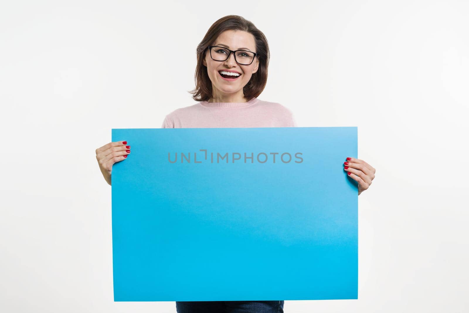 Smiling middle aged woman with blue sheet billboard by VH-studio