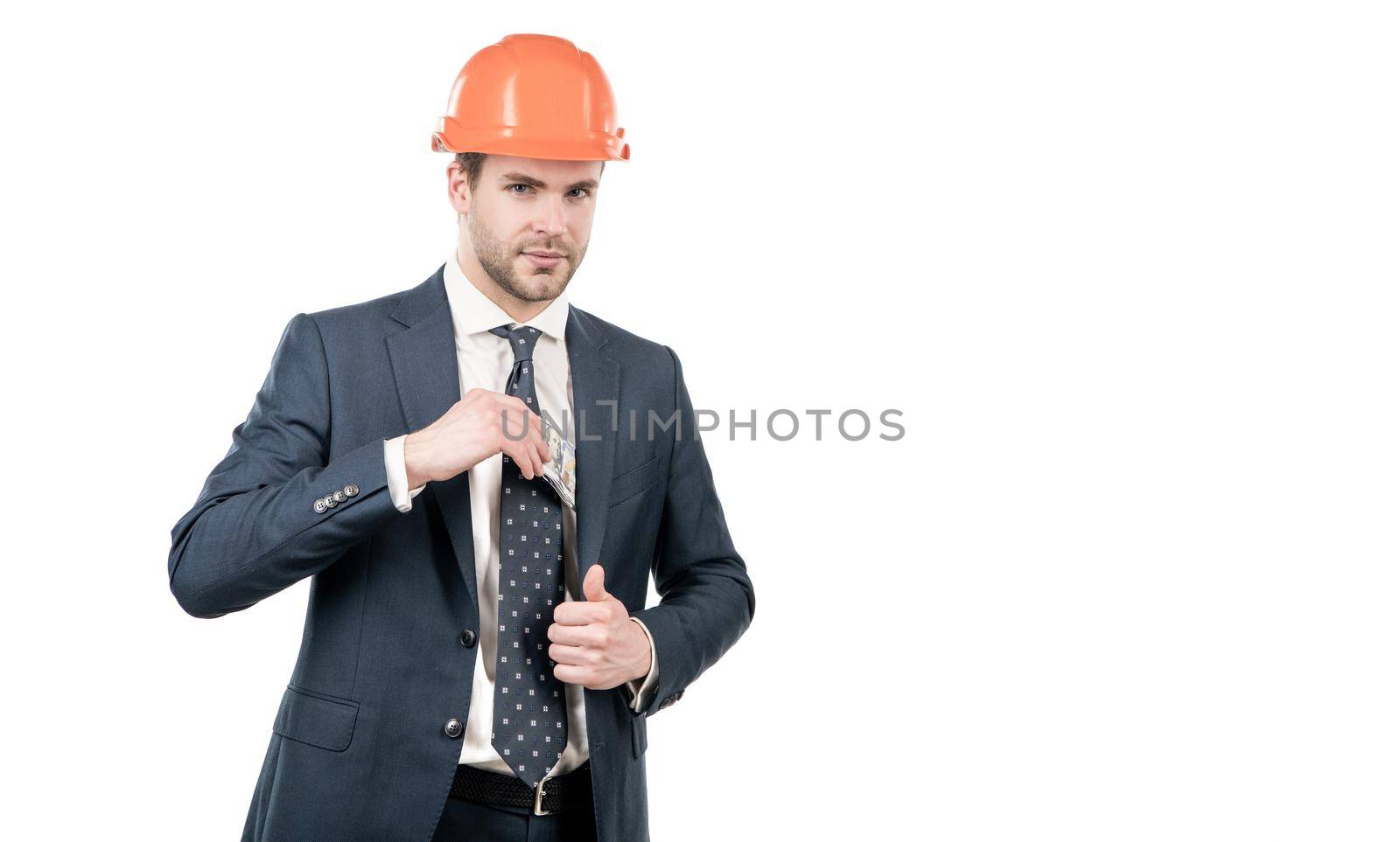 Civil engineer man in hardhat put money cash in jacket pocket isolated on white copy space, earnings by RedFoxStudio