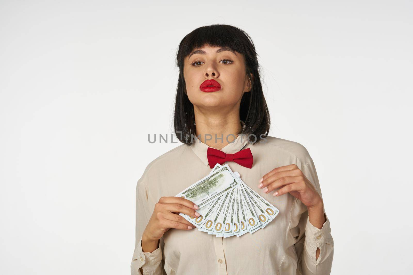 rich woman with money in hands dollars finance. High quality photo