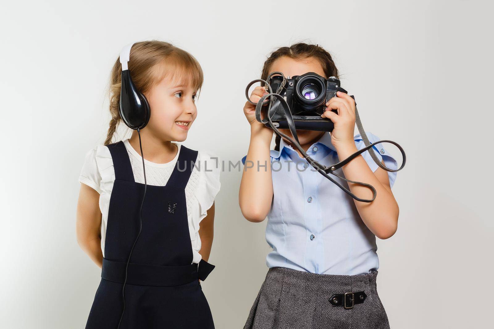 Two adorable little schoolgirls for a break by Andelov13