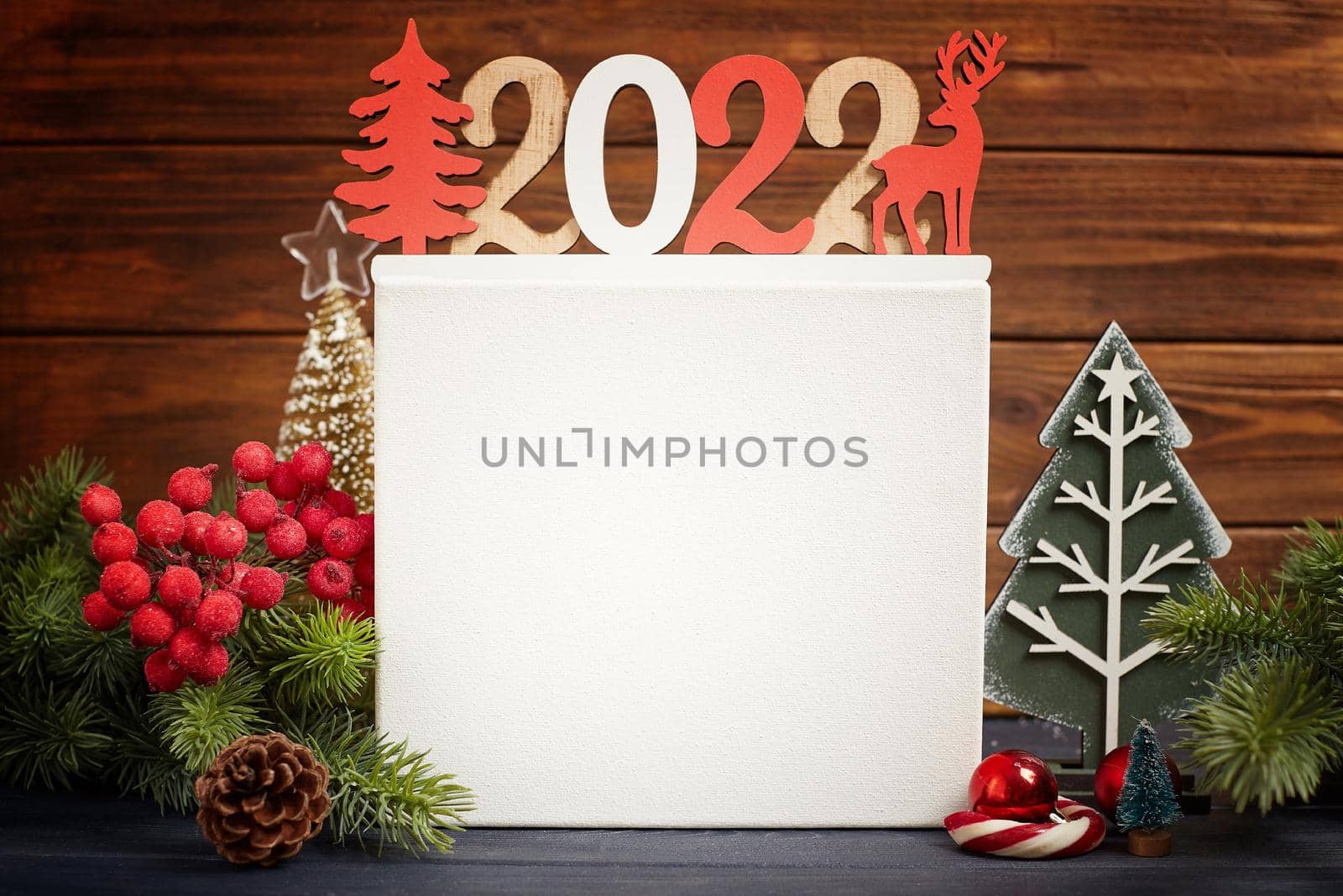 Christmas Decoration With Ornament And Defocused Lights , Christmas card with fir and decor on glitter background by Maximusnd