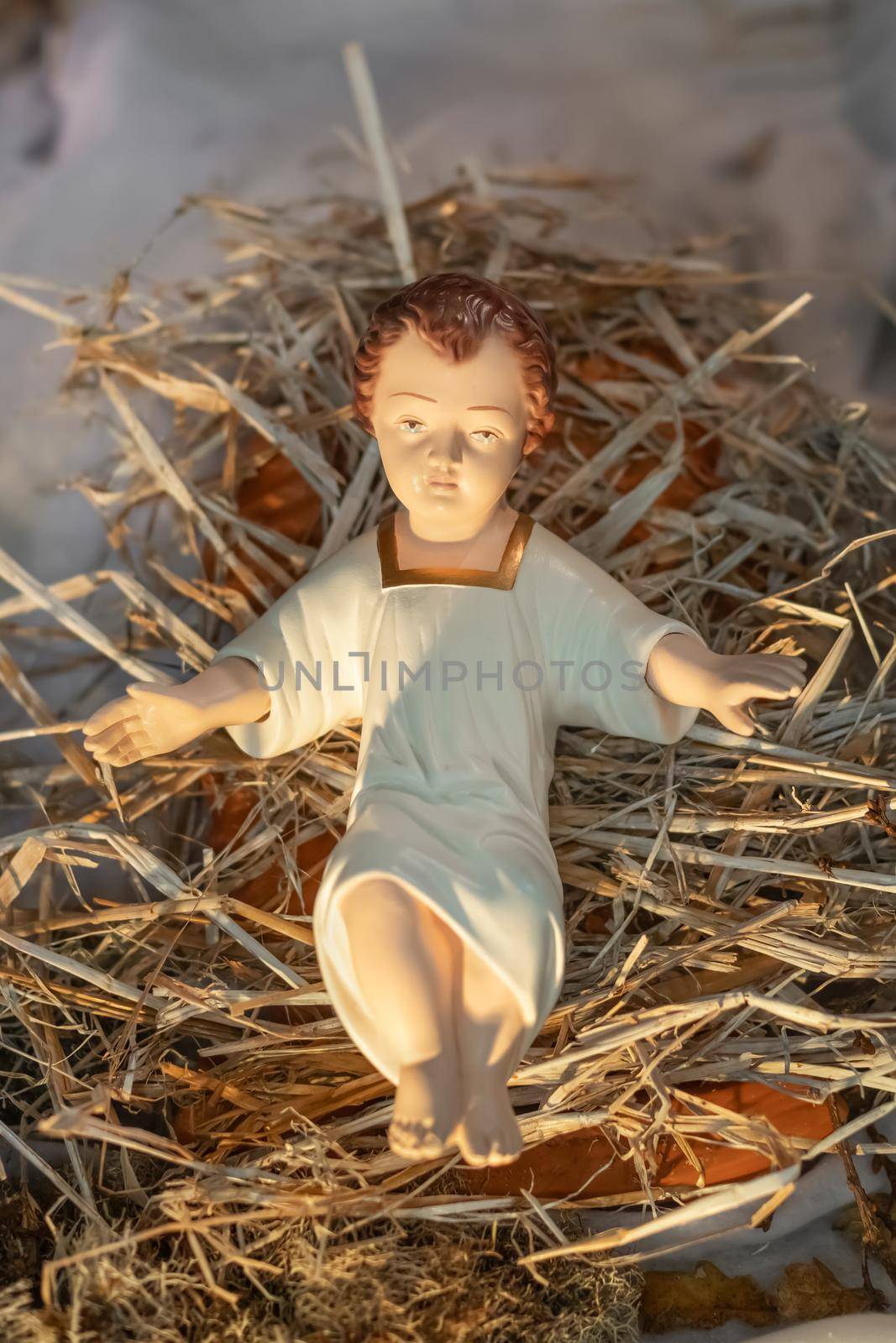 Baby Jesus laying in a cradle