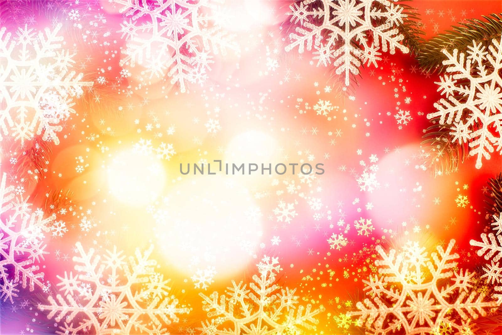 Red Christmas holidays background; greeting card , Christmas card with fir and decor on glitter background