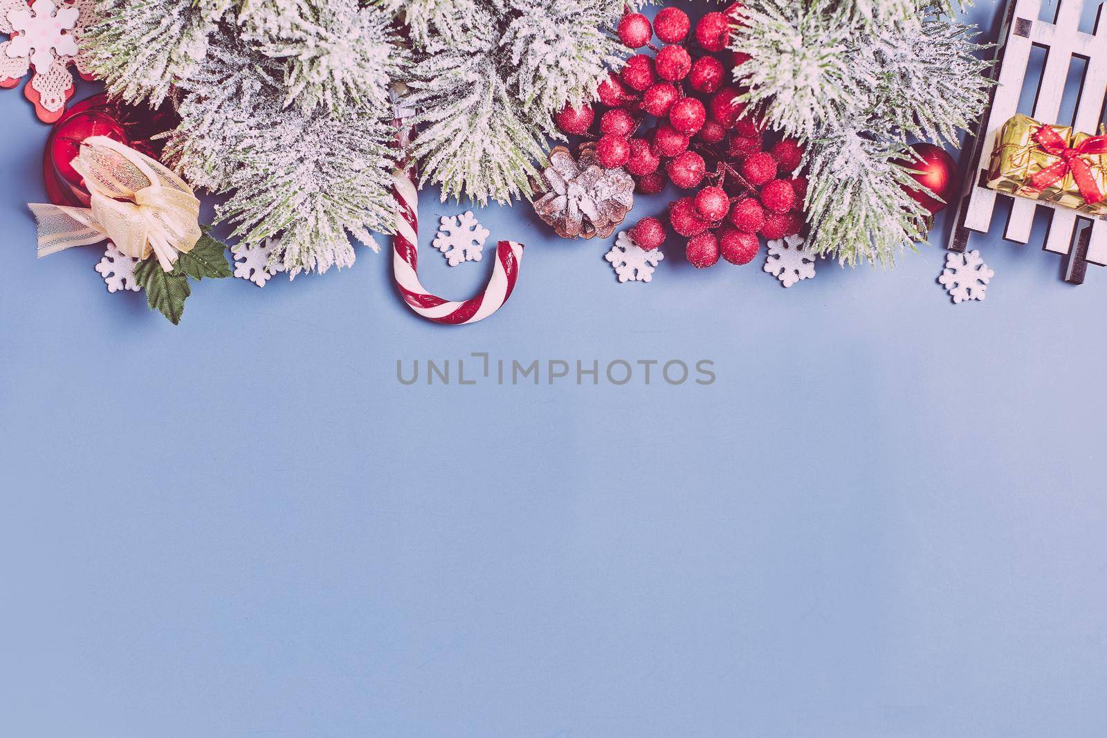 Wooden table decorated with Christmas gifts. Background with copy space mockup. Merry Christmas and happy new year.