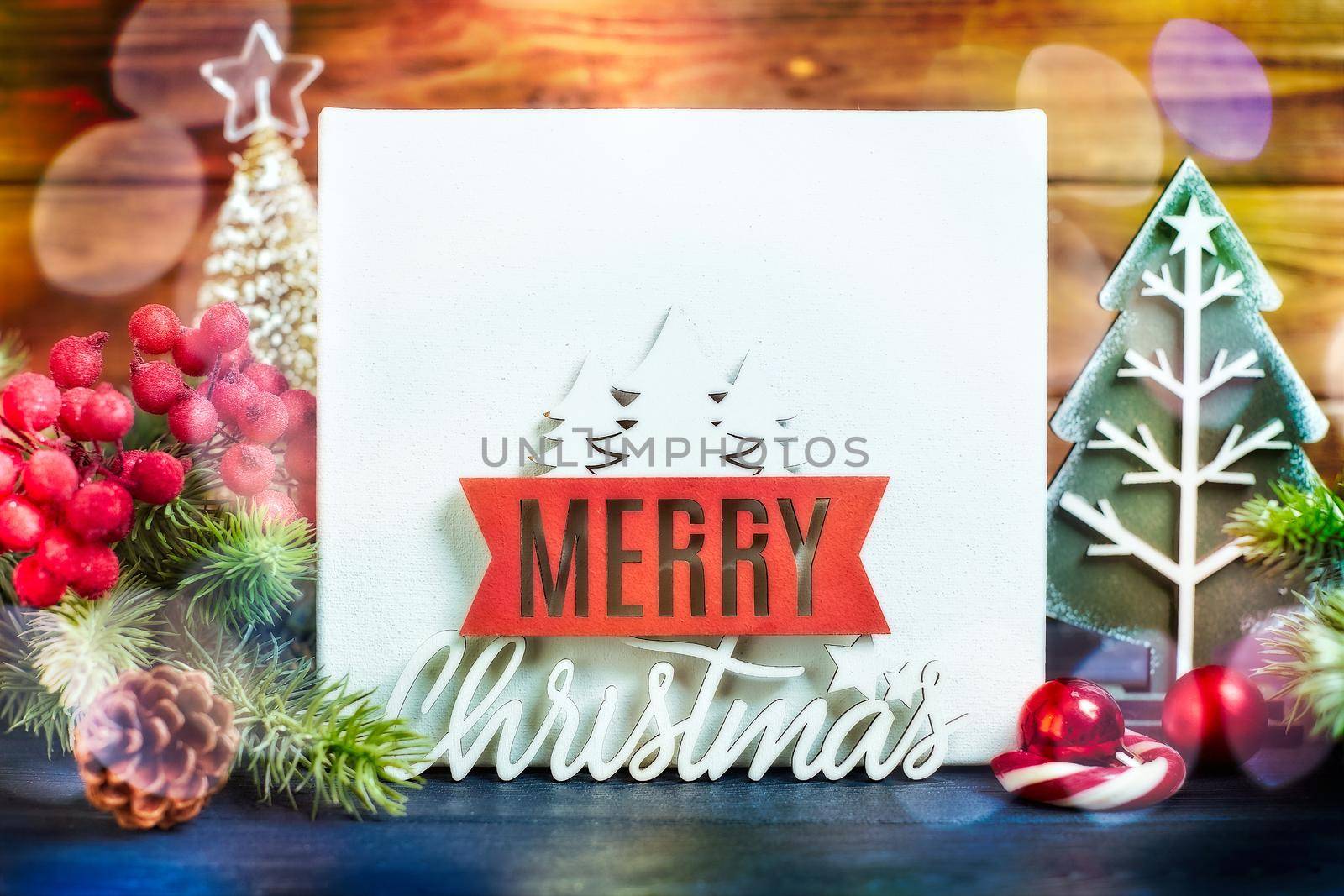 Wooden table decorated with Christmas gifts. Background with copy space mockup. Merry Christmas and happy new year. by Maximusnd