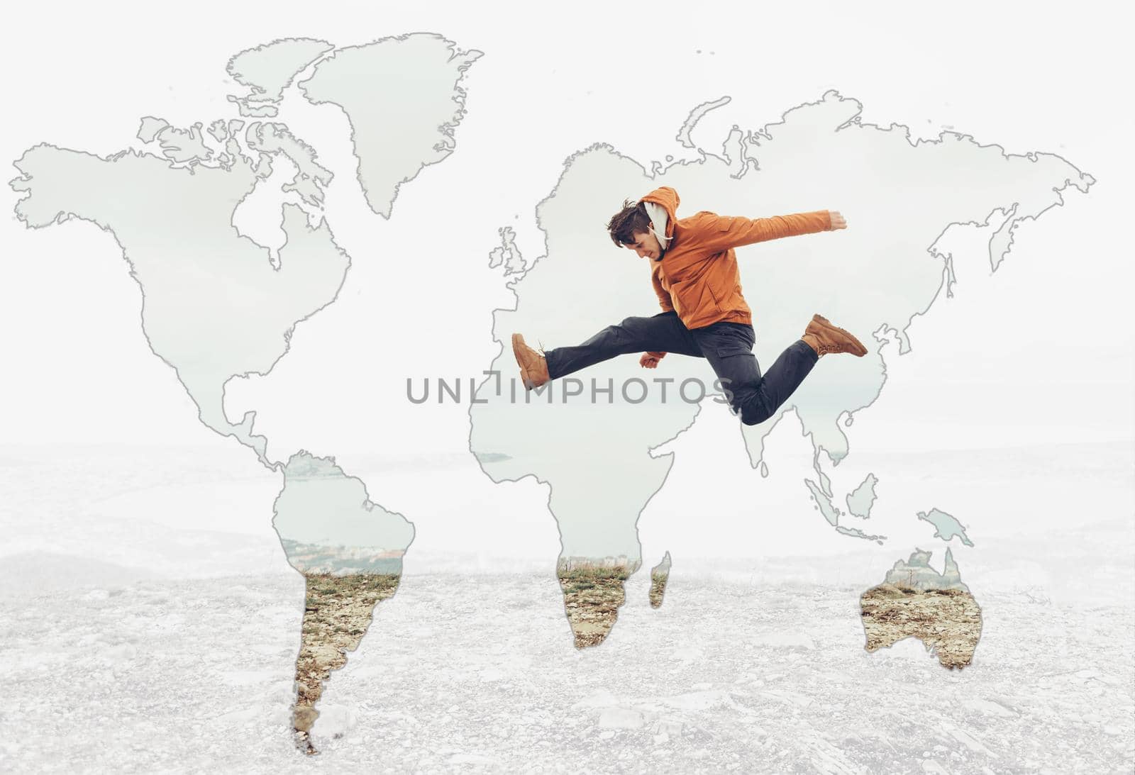 Double exposure of young man jumping outdoor with map of world, concept of travel and happiness.