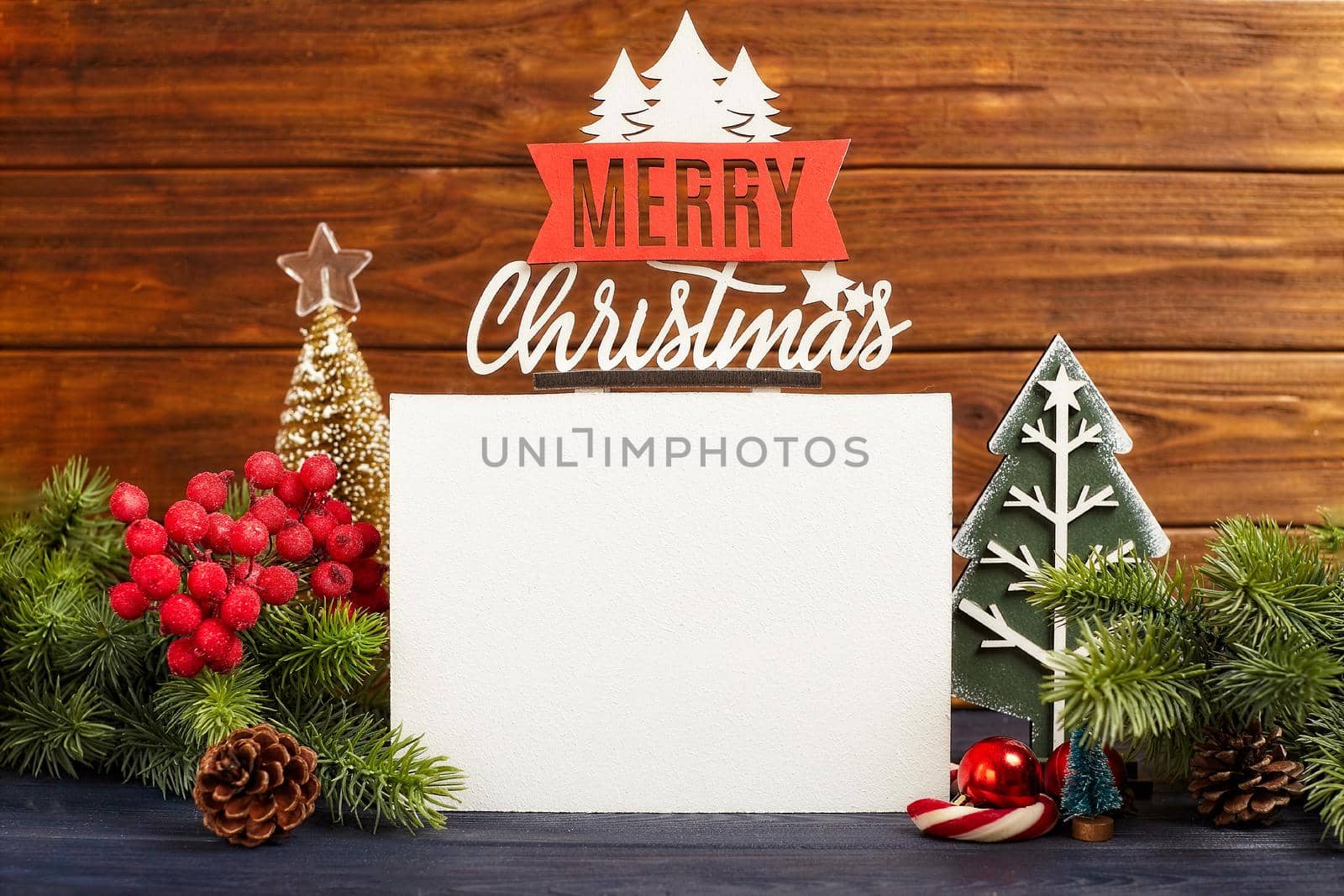 Christmas Decoration With Ornament And Defocused Lights , Christmas card with fir and decor on glitter background by Maximusnd