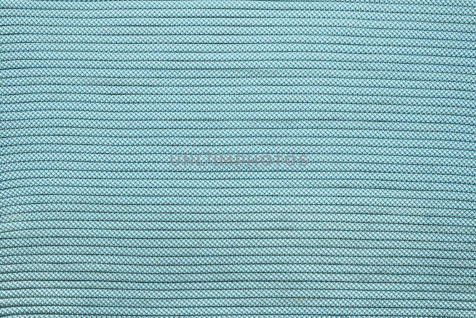 Rows of climbing rope blue color, top view, texture.