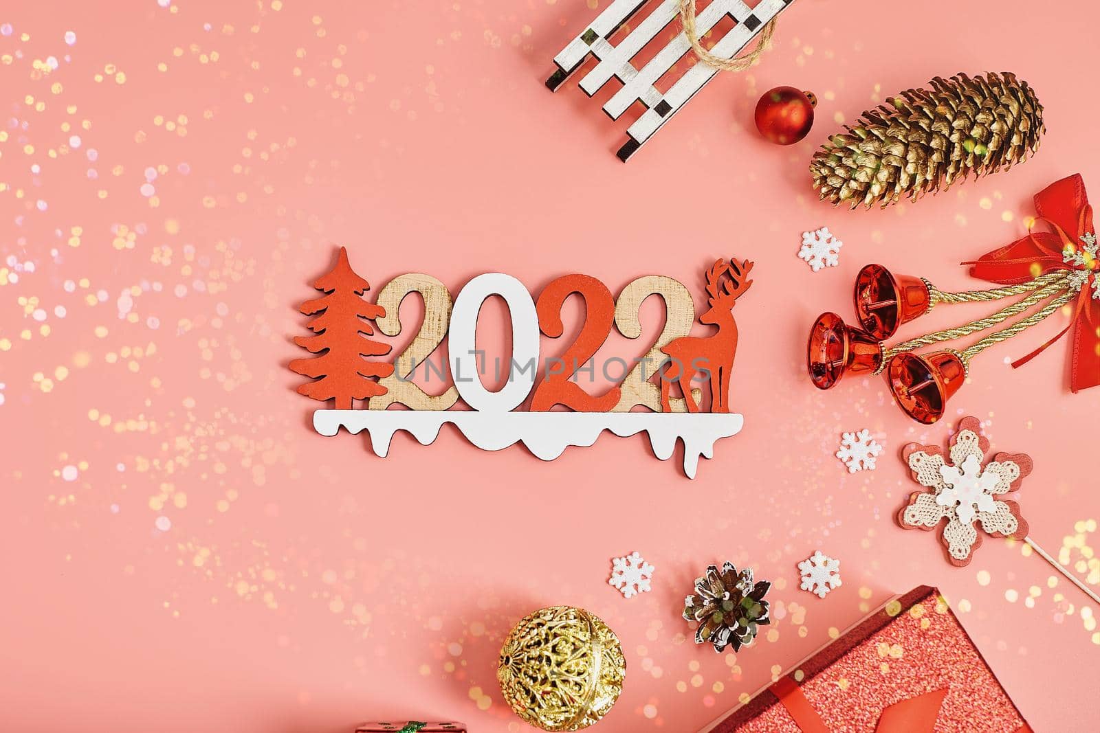 Happy New Year holiday concept. New Year decorations,  tree, snowflake, pine cone, gifts on  background. Holiday party greeting card mockup with copy space. Flat lay, top view, overhead.