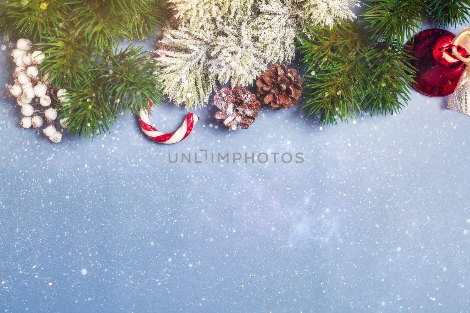 Christmas background with fir tree and decor. Top view with copy space by Maximusnd