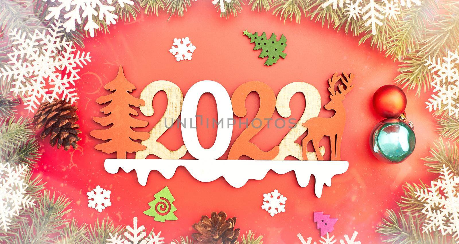 Christmas holidays composition on red background with copy space for your text 2022 by Maximusnd
