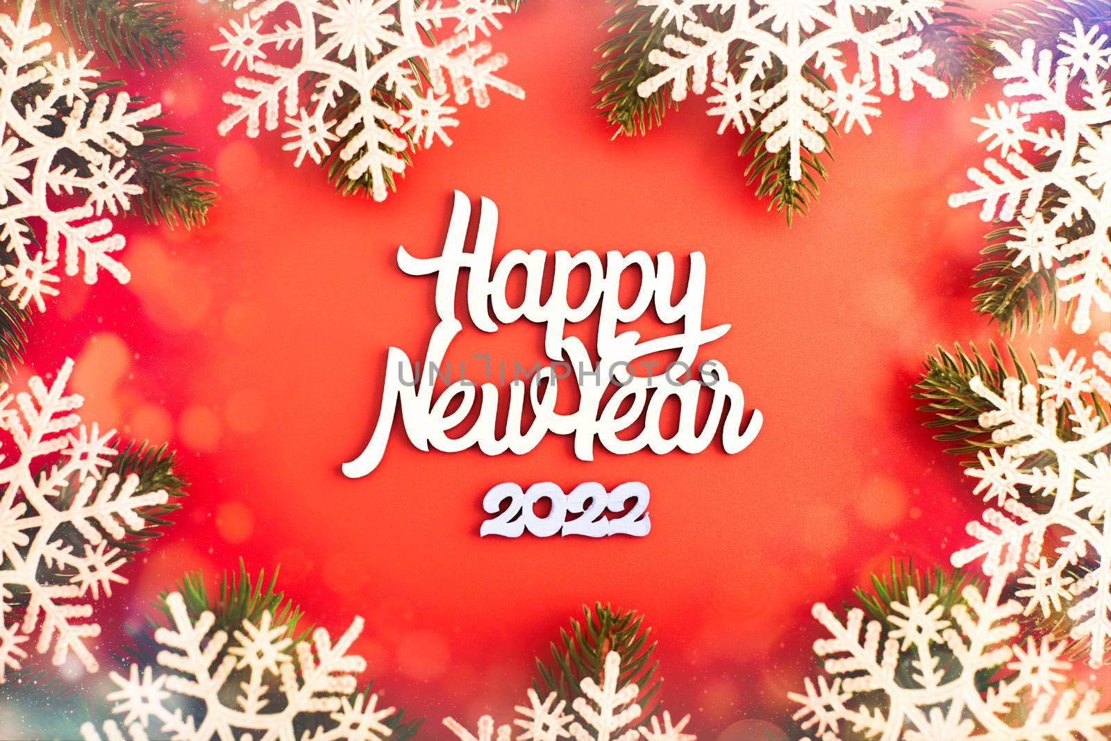 Sparkle bokeh lights on red canvas background. Merry christmas card. Winter holiday theme. Happy New Year.