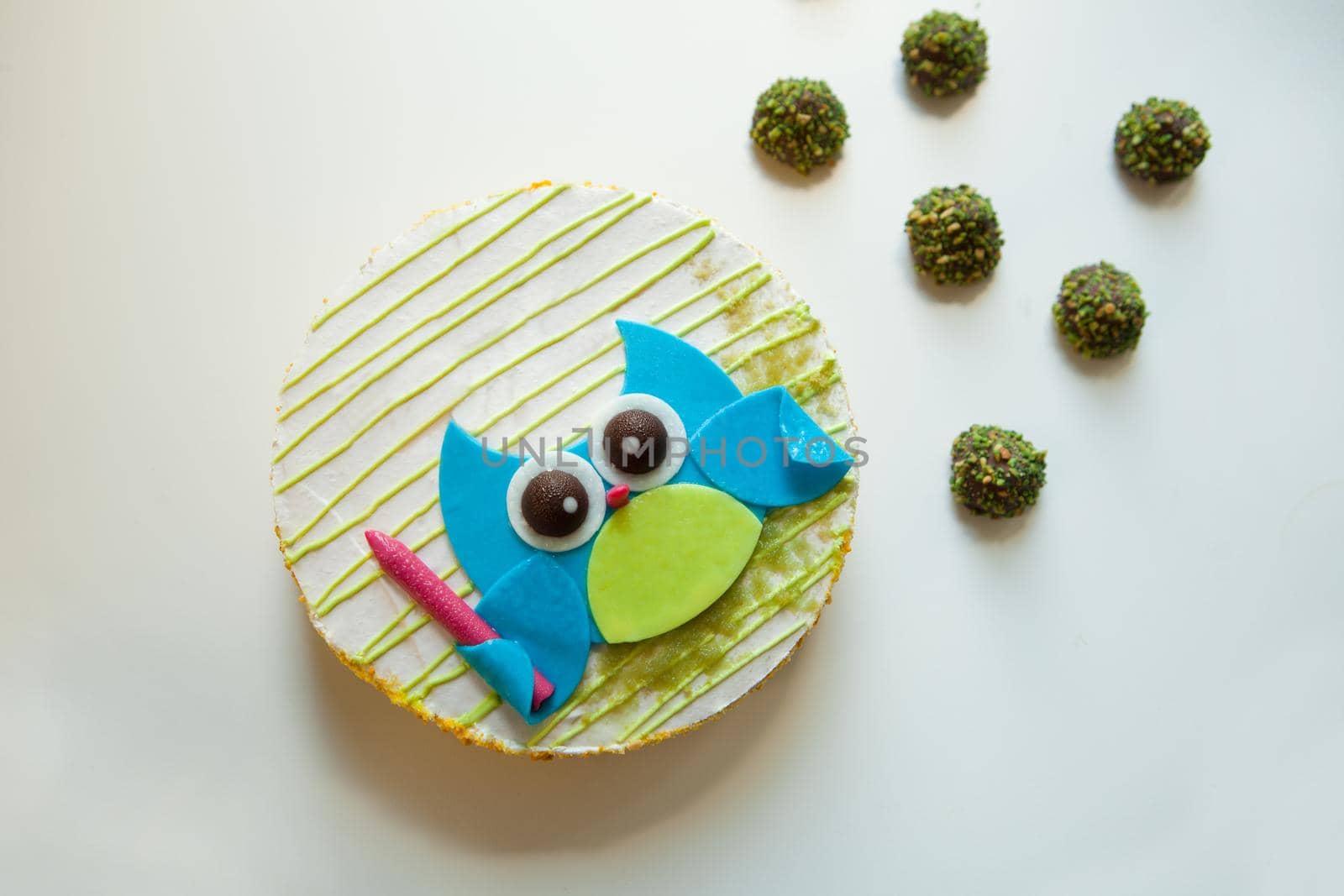 colorful cake for school party with owl. Beautiful Cake for Back to school with learning, education design and candies