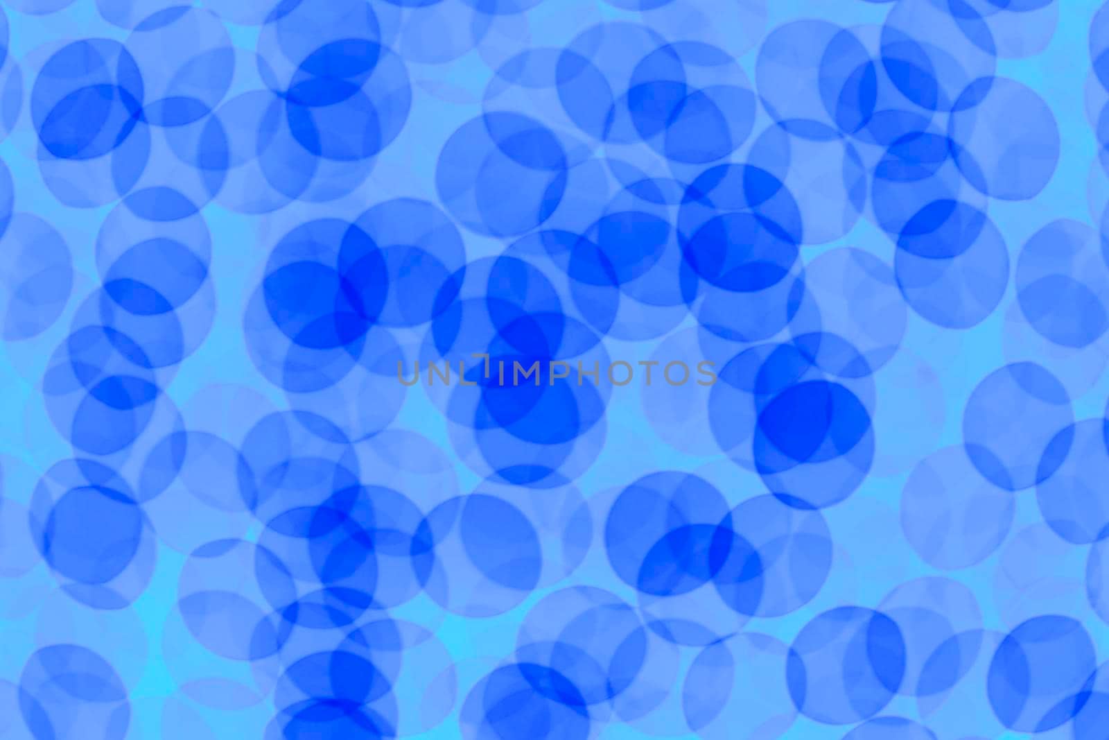 Blue Blurred lights background. Defocused glitter background
