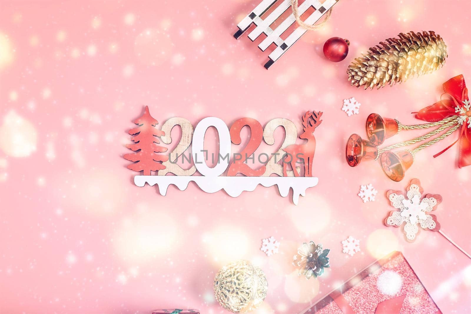 Happy New Year holiday concept. New Year decorations,  tree, snowflake, pine cone, gifts on  background. Holiday party greeting card mockup with copy space. Flat lay, top view, overhead.