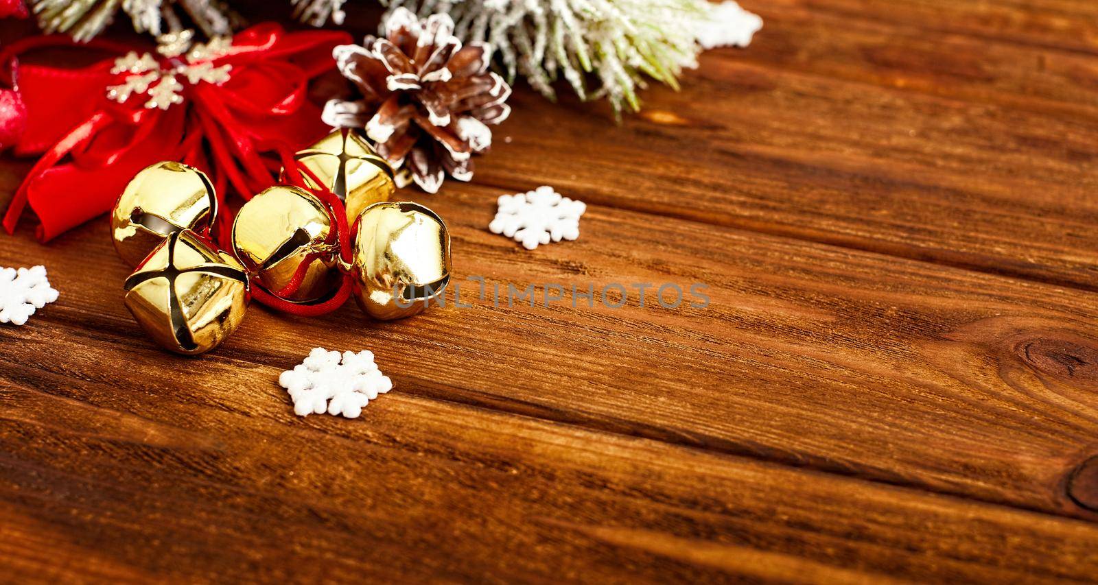 Christmas wooden background with snow fir tree. View with copy space . Copy space framed by Christmas tree branches, decorations, sweets. by Maximusnd