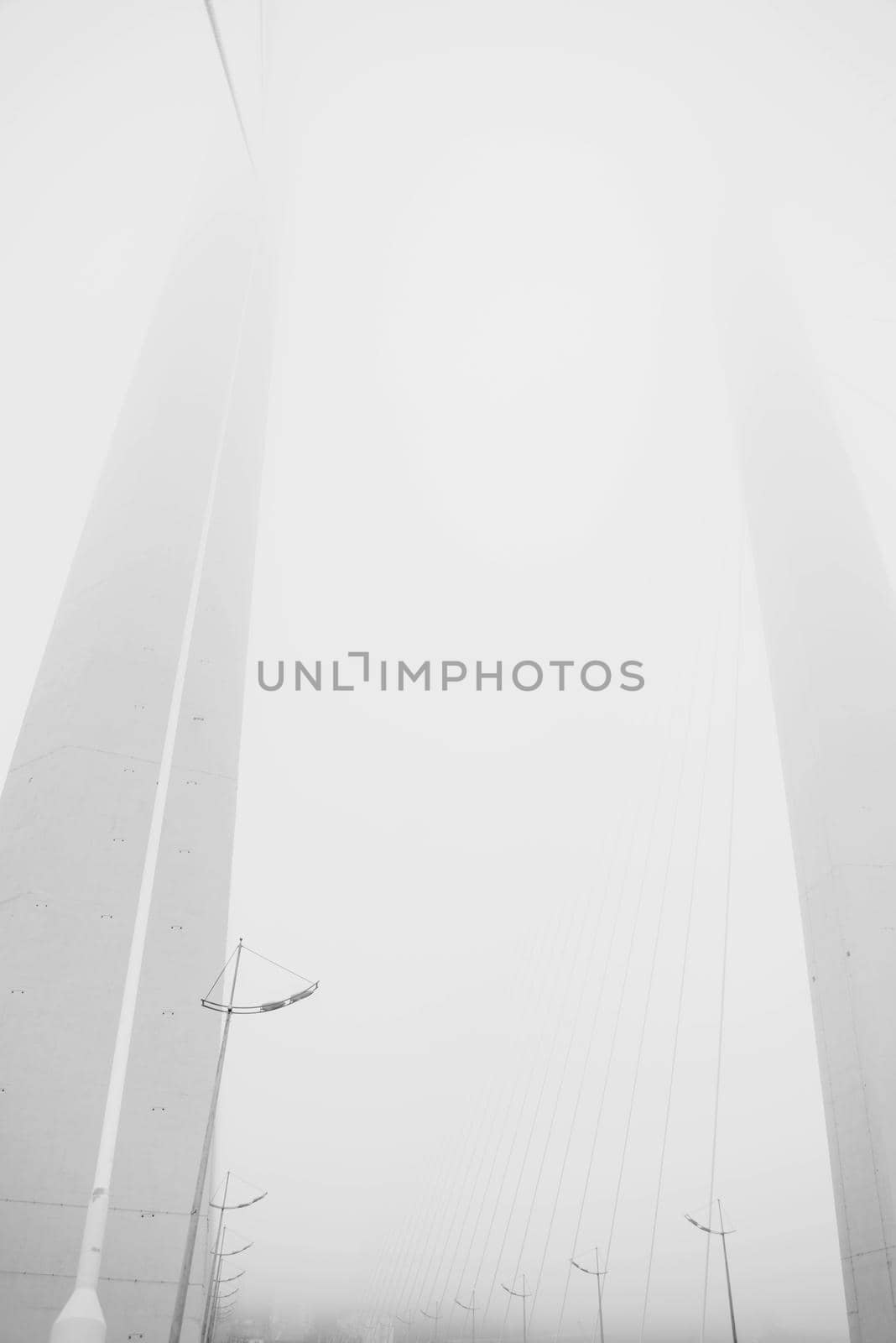 Modern bridge in the fog.