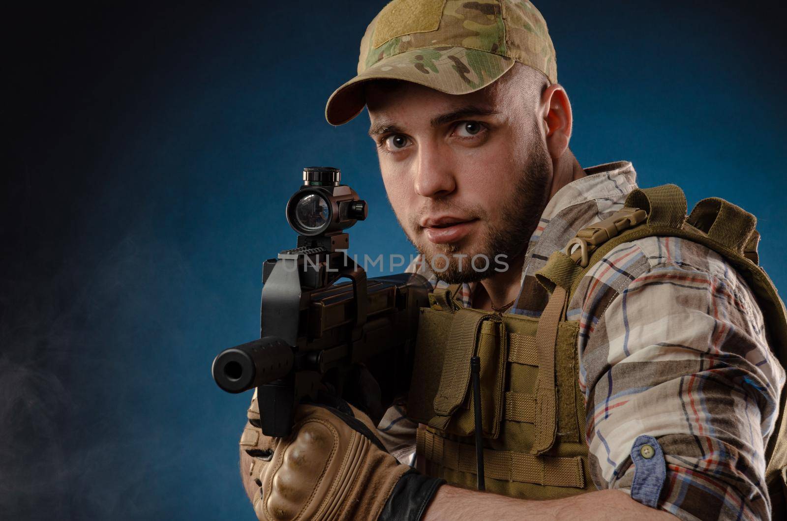 guy's a military agent in a bulletproof vest with an automatic rifle by Rotozey