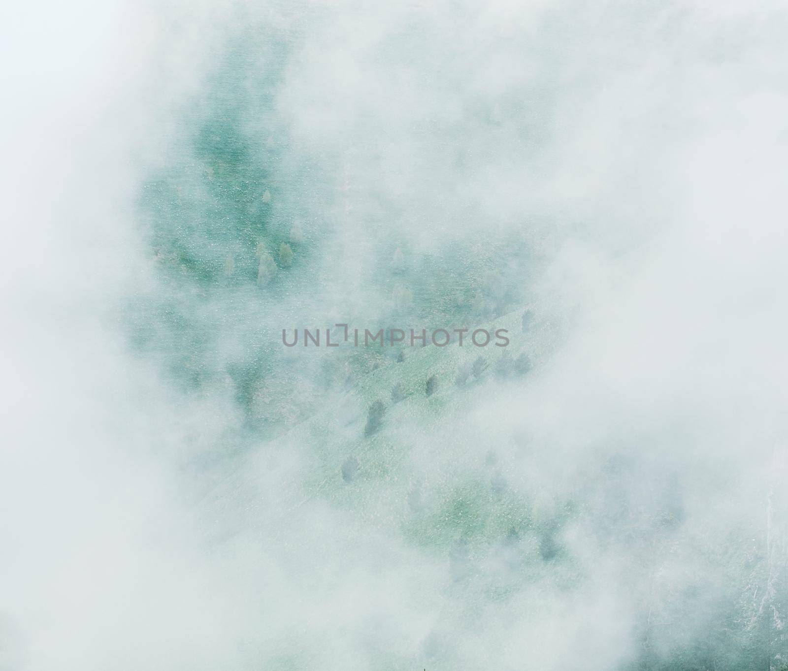 Dense mist over a mountain valley.