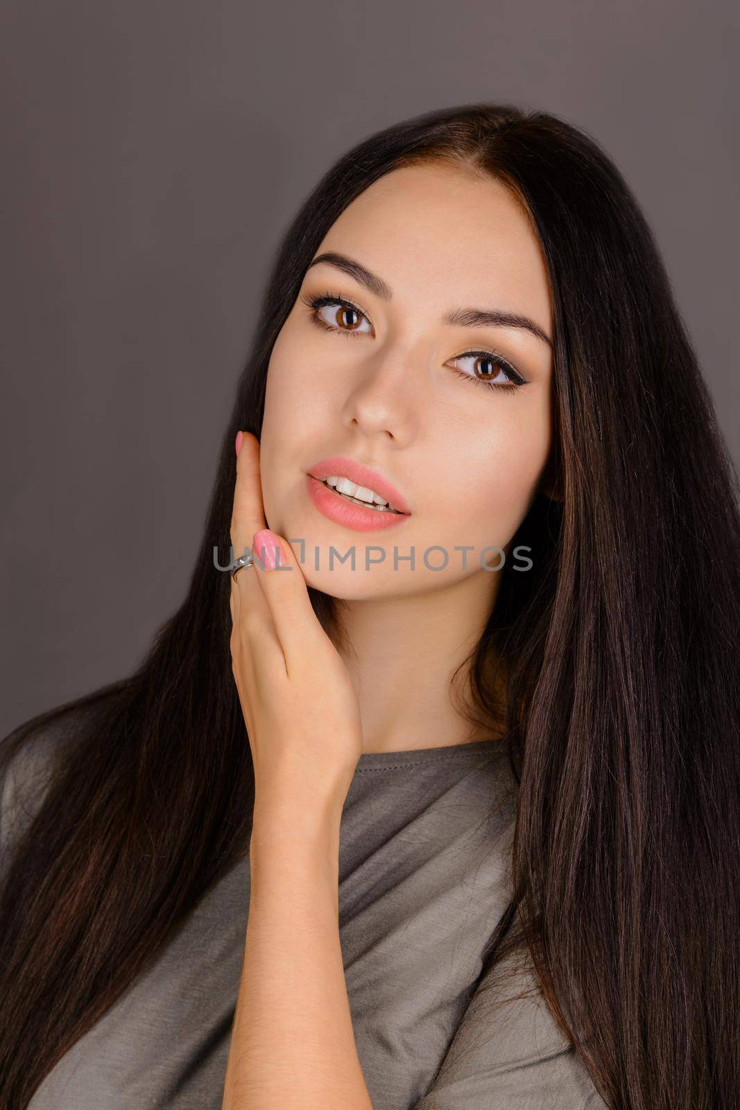 Beautiful Young Woman Touching Her Face.Fresh Healthy Skin by zartarn