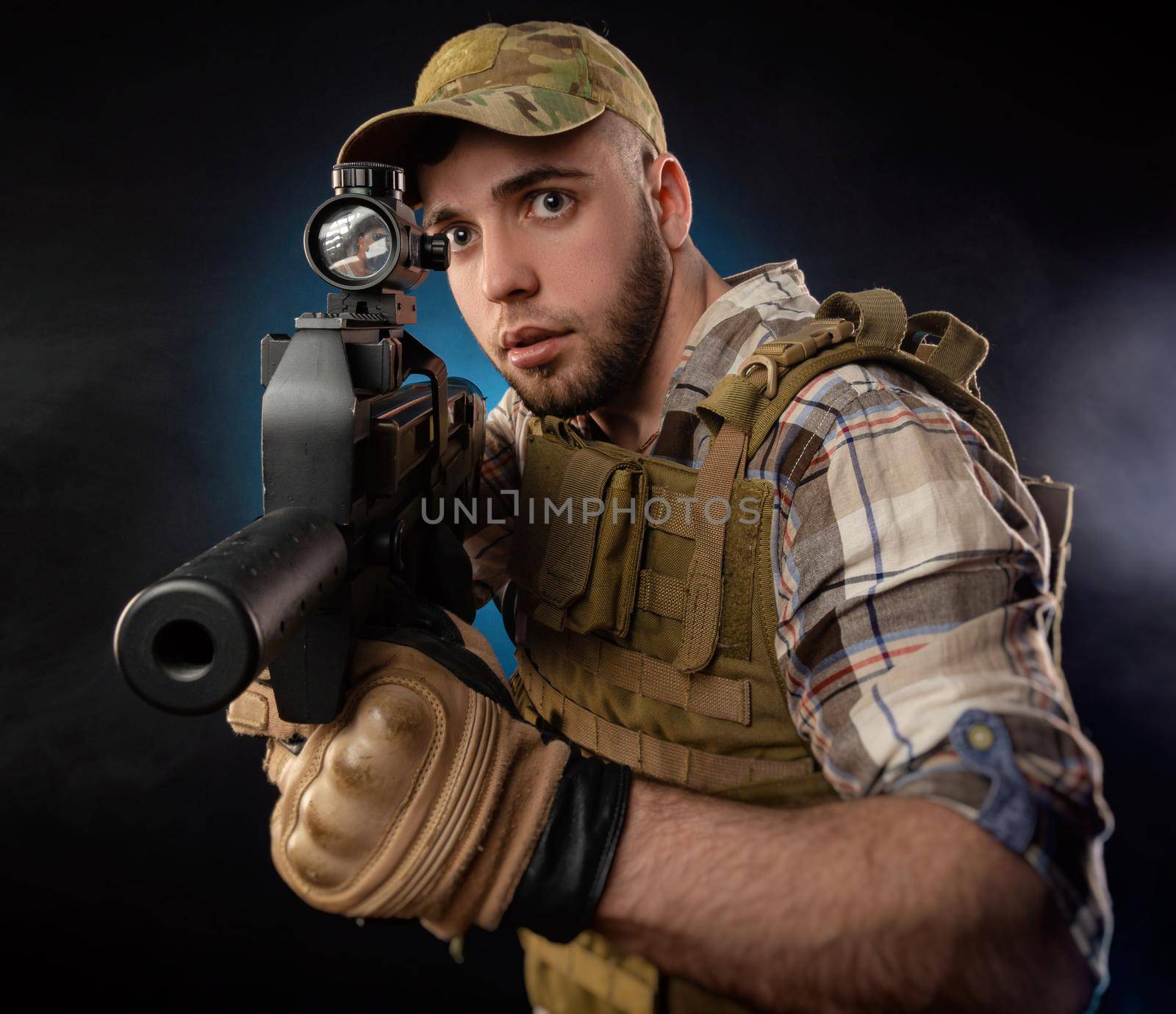 guy's a military agent in a bulletproof vest with an automatic rifle by Rotozey