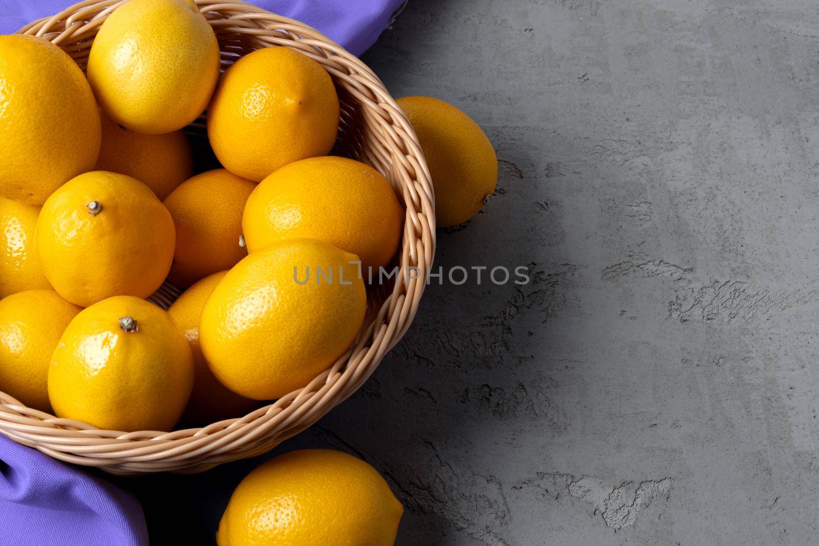 Lemons on concrete background, view from above. High quality photo