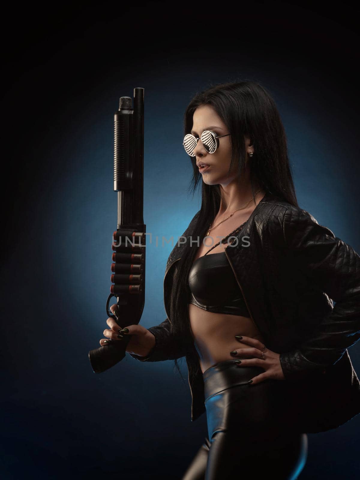 girl in a leather jacket with a shotgun by Rotozey
