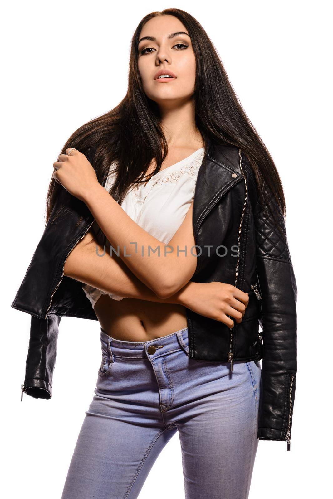 Elegant brunette woman in jeans with a leather jacket by zartarn